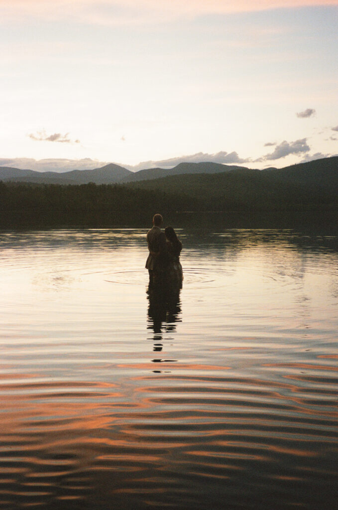 The sunset on Chocorua Lake in Tamworth NH on an elopement day. 