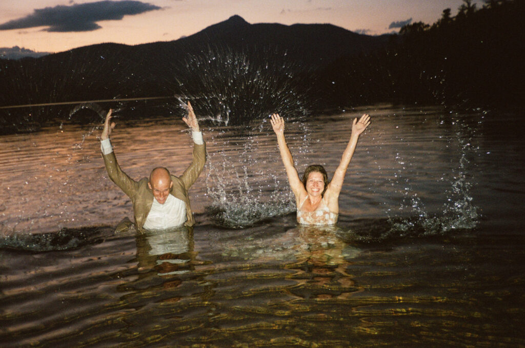 Splashing in Chocorua Lake at a Chocorua Lake elopement
