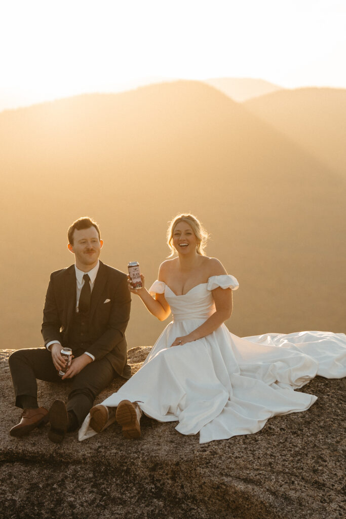 A couple having a cider on a mountain 
