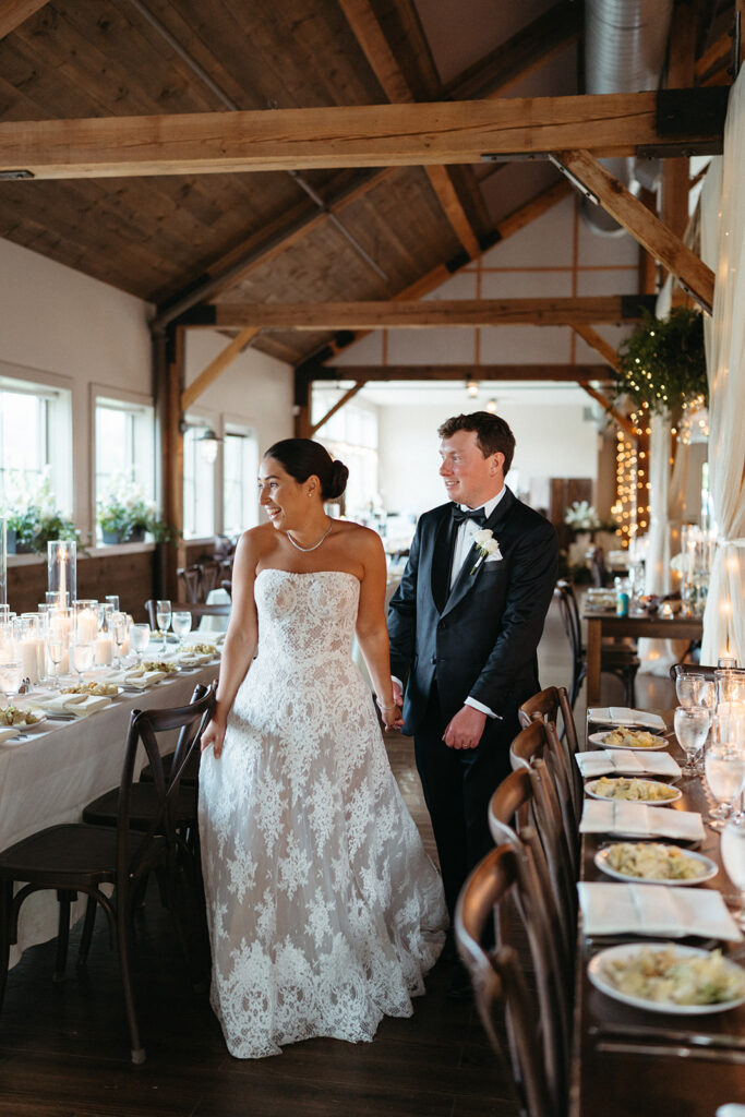 The couple seeing the Barn at Mountain Top Resort set up for their reception for the first time. 