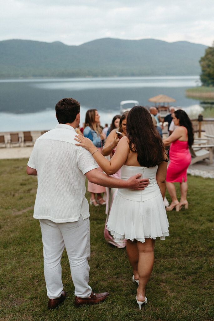 The couple walking towards the lake at the Lakefront Beach Pavilion 