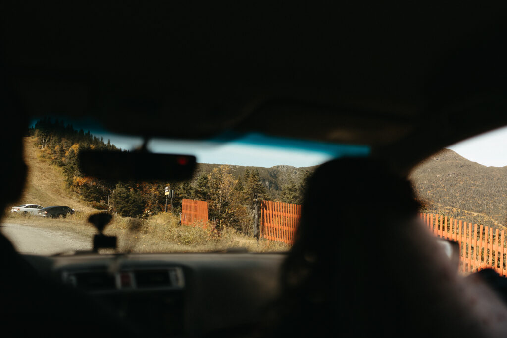 The view from the back seat of the car going up the Auto Toll Road. 